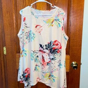 Floral Sleeveless shirt. Size XL